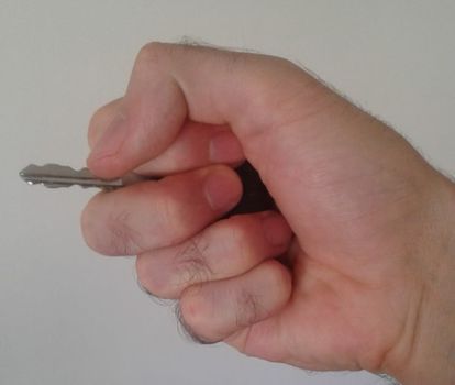 key between fingers